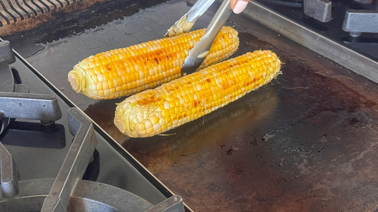 adding oil to grill pan