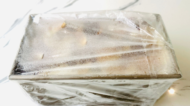Loaf pan covered with plastic