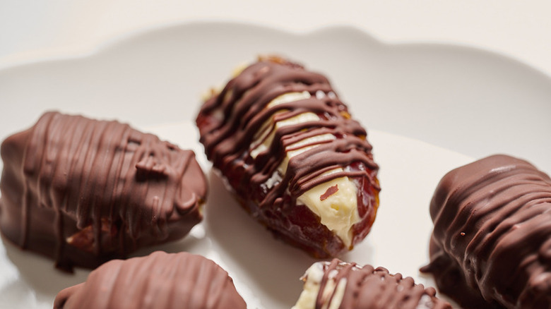 Chocolate cheesecake stuffed dates on plate