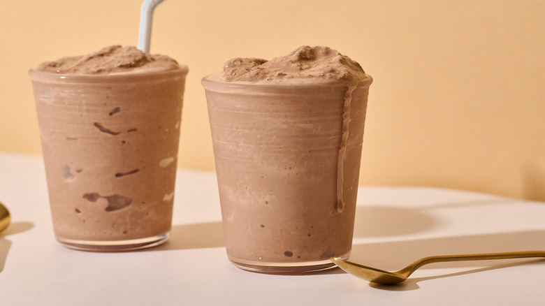 Frozen chocolate milkshakes in glasses