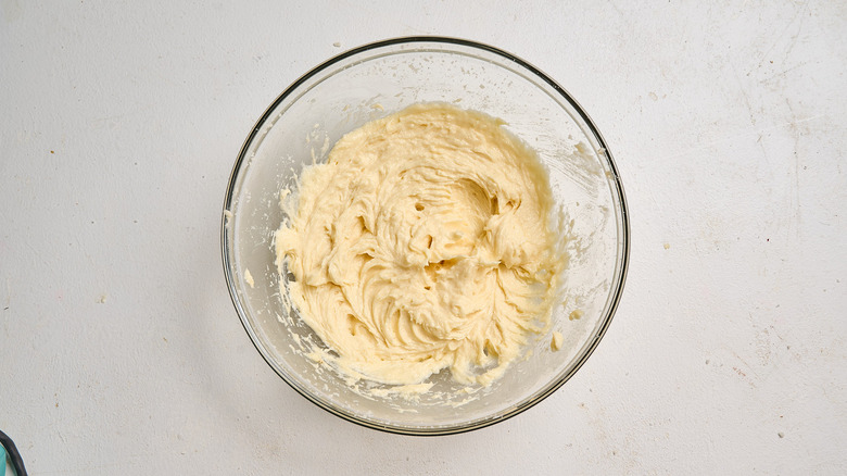 batter in a bowl after adding eggs