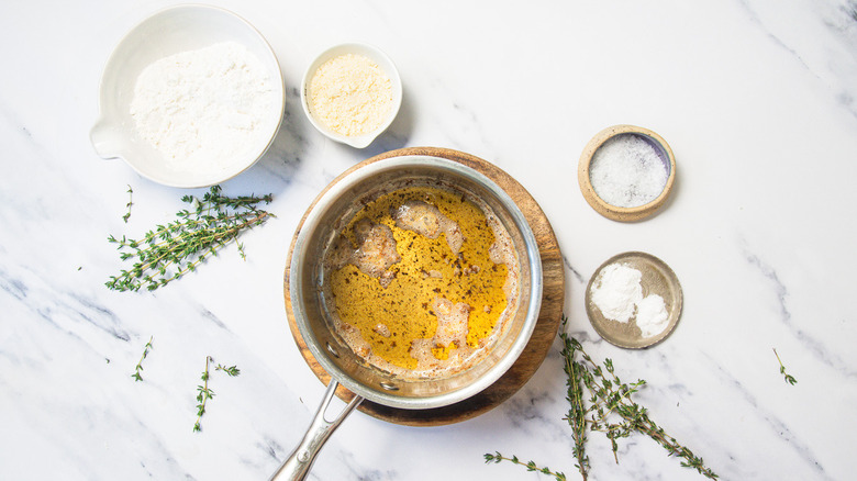 Brown butter in saucepan.