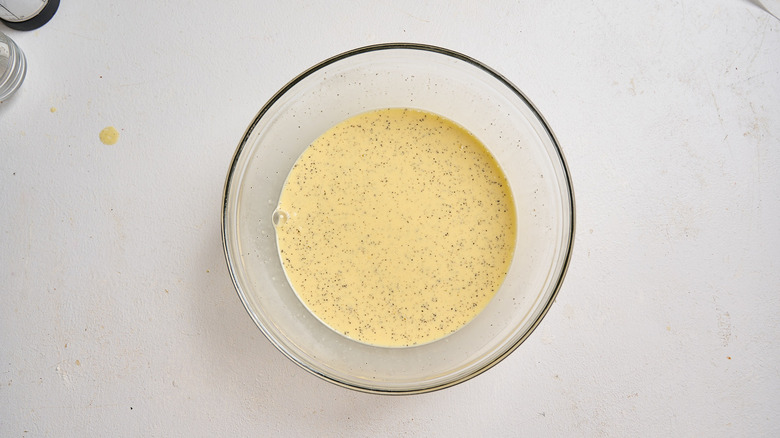 egg and milk whisked together in bowl