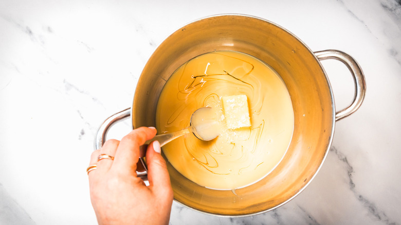 Caramel components in pot.