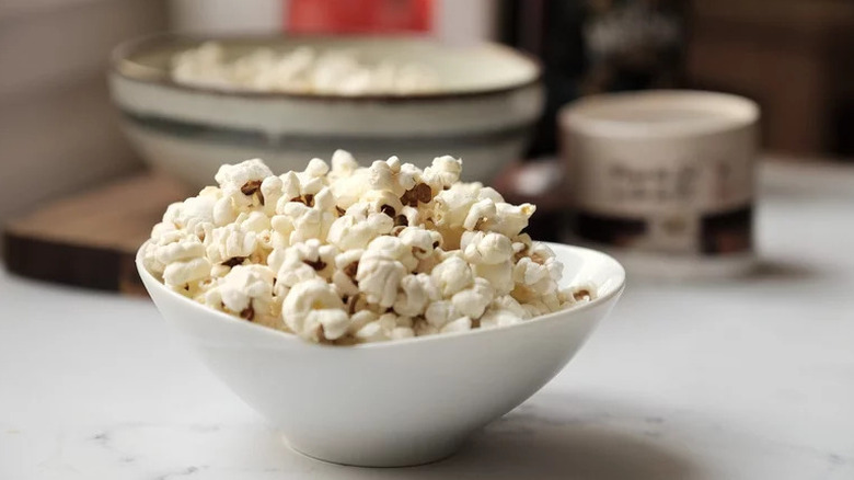 Air Fryer Popcorn in small white bowl