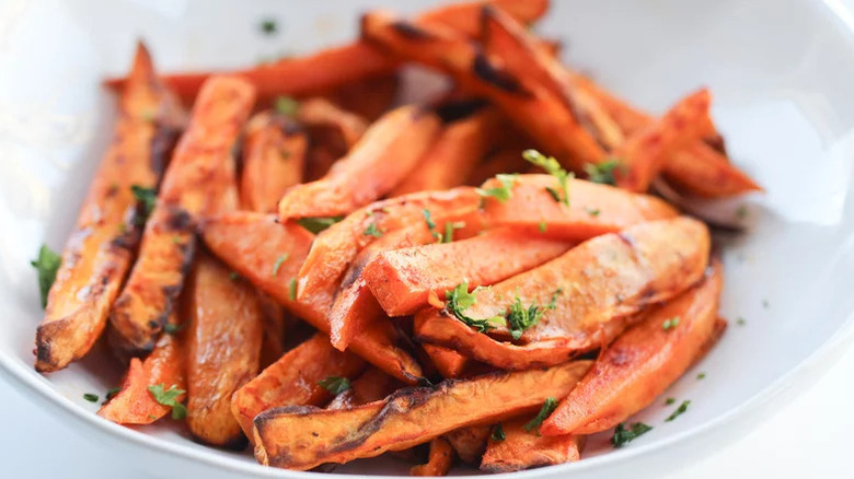 Crispy Air Fryer Sweet Potatoes on white plate