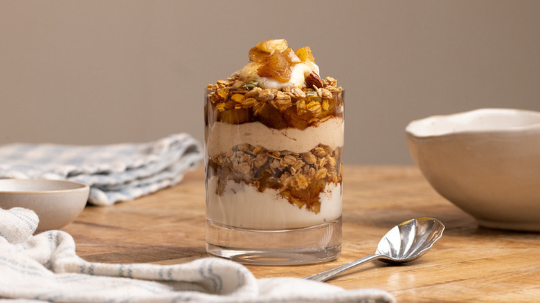 Apple breakfast parfait in dessert glass