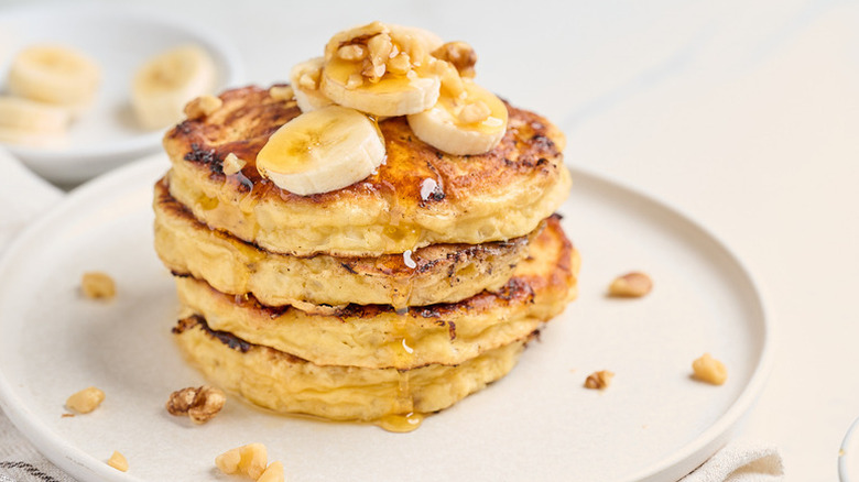 Stack of banana pancakes on plate
