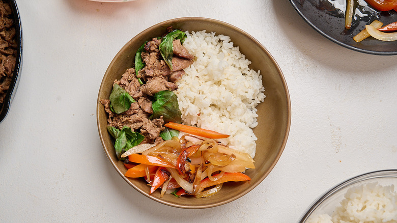 beef, rice, and peppers in a bowl
