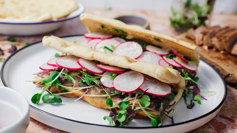 Seared Ahi Tuna Flatbread Sandwiches on white plate