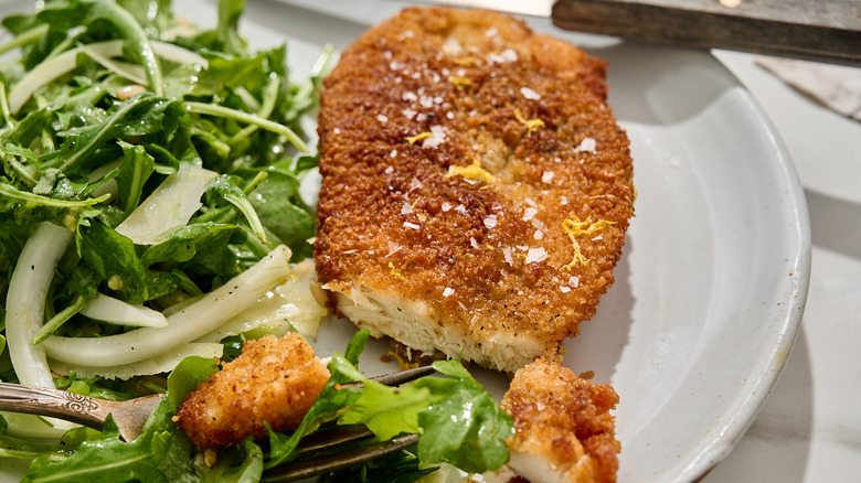 chicken cutlet sliced on a plate