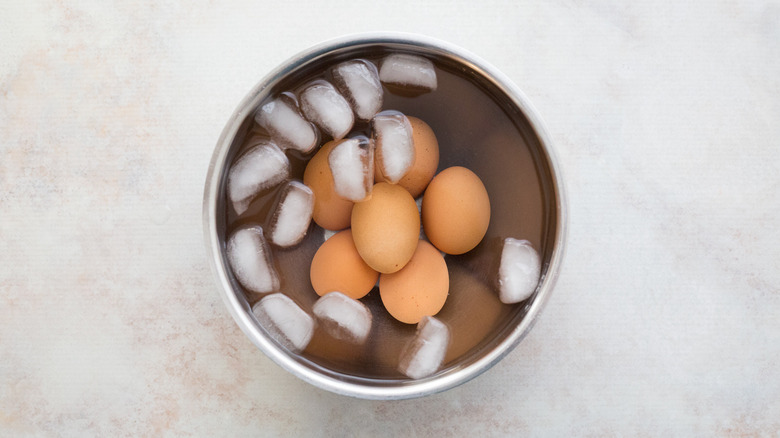 brown eggs in ice water