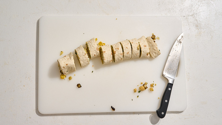 slicing lavash roll into pinwheels
