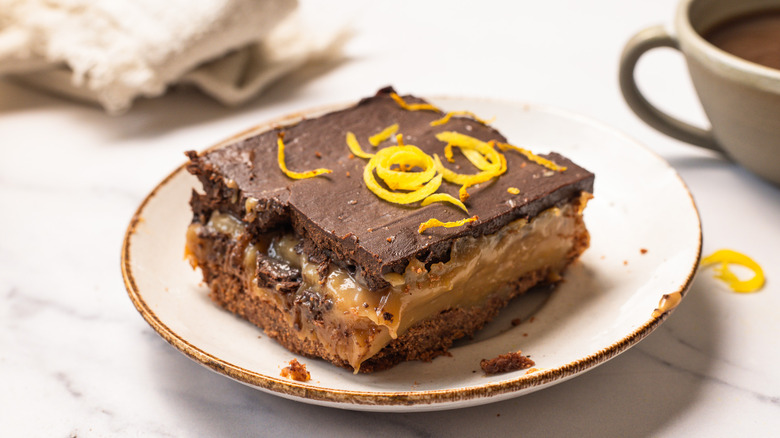 A chocolate lemon bar slice on a plate