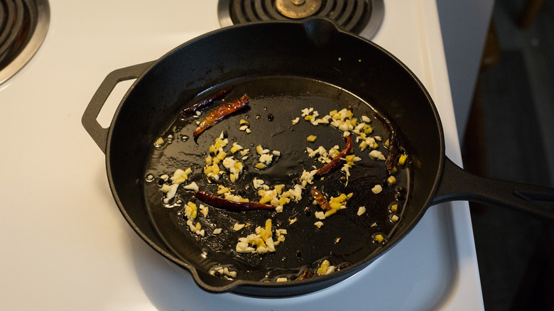 garlic and chiles in pan