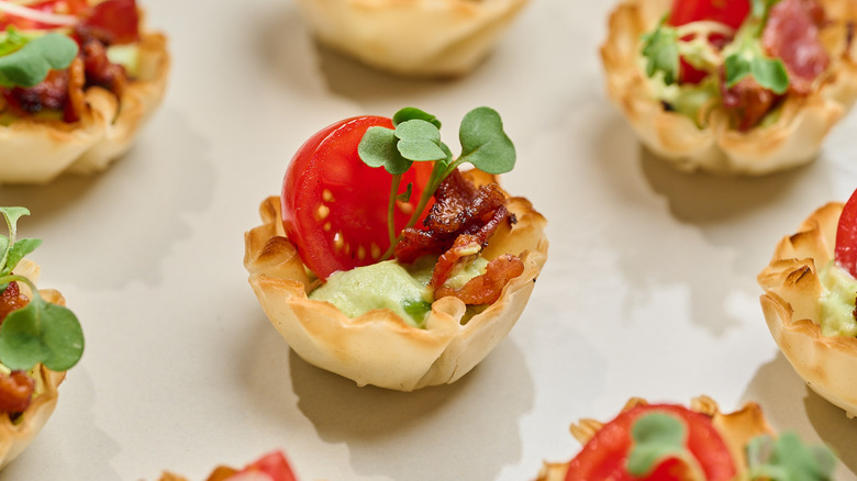 blt phyllo cup on a table
