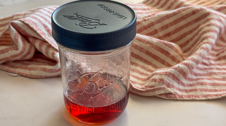 jar with cider and lid