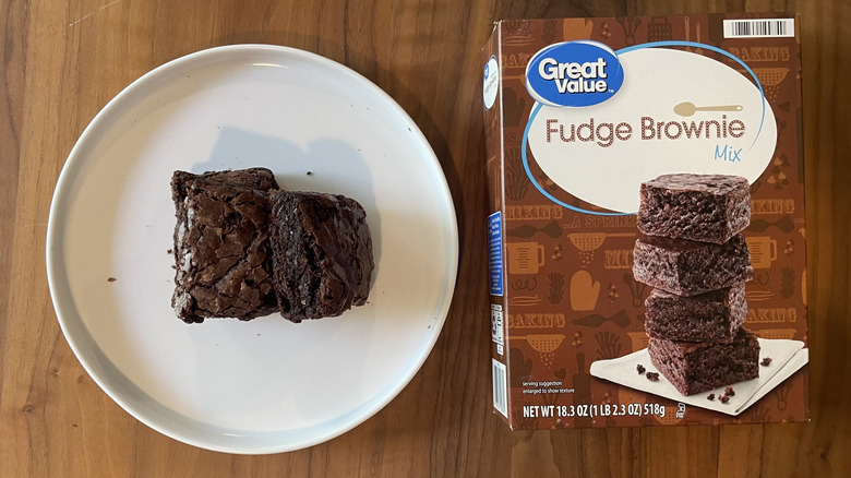 Great value brownie mix box and baked brownies on a plate