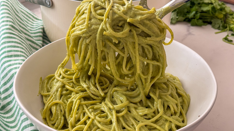 serving spoon full of pasta