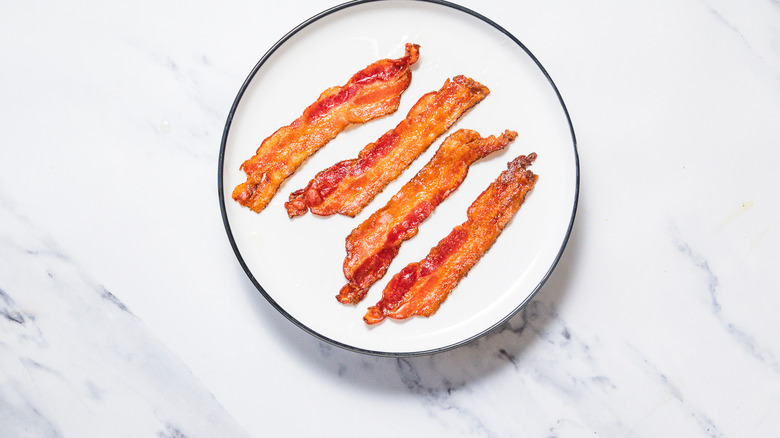 Cooked bacon on plate