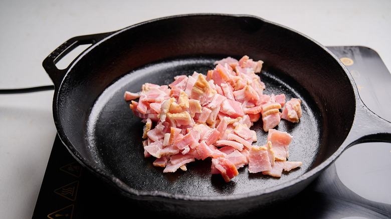bacon pieces in a skillet