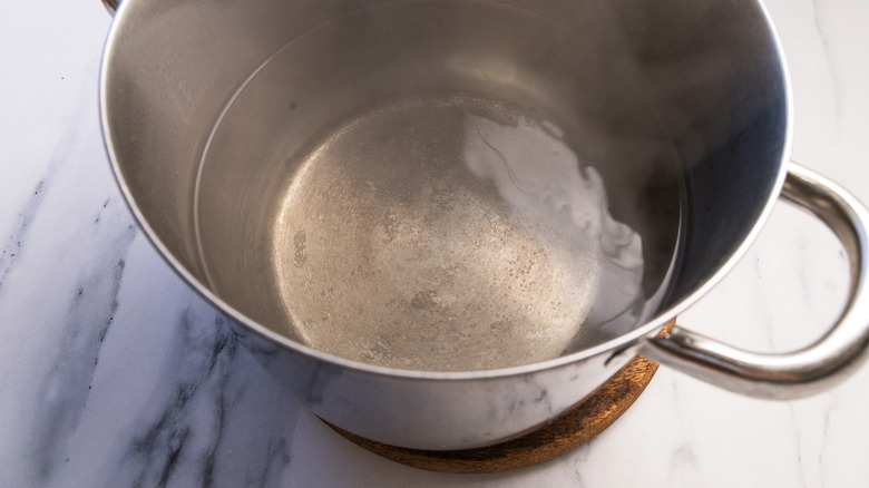 Hot water in pan