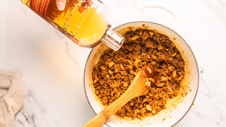 Adding bourbon to meat sauce