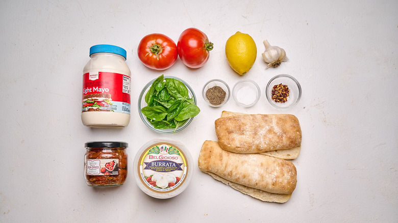 Tomato sandwich ingredients on a table