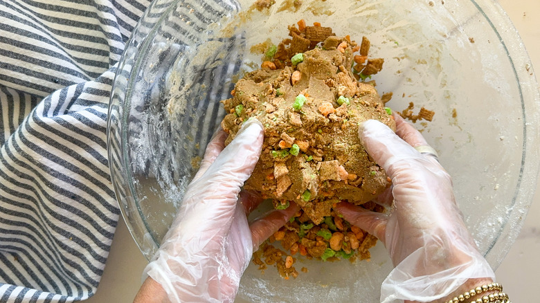 hands mixing batter