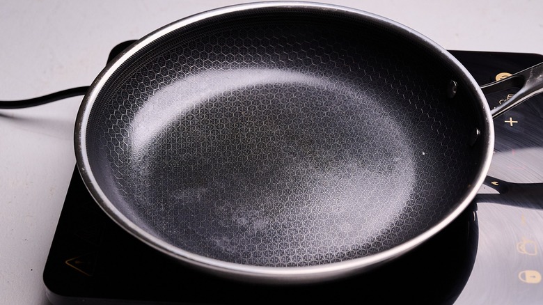 skillet heating up on a stove