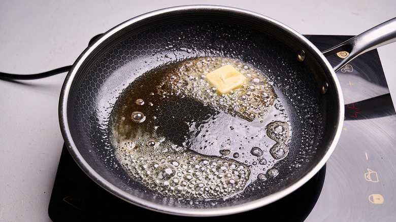 melting butter in a skillet