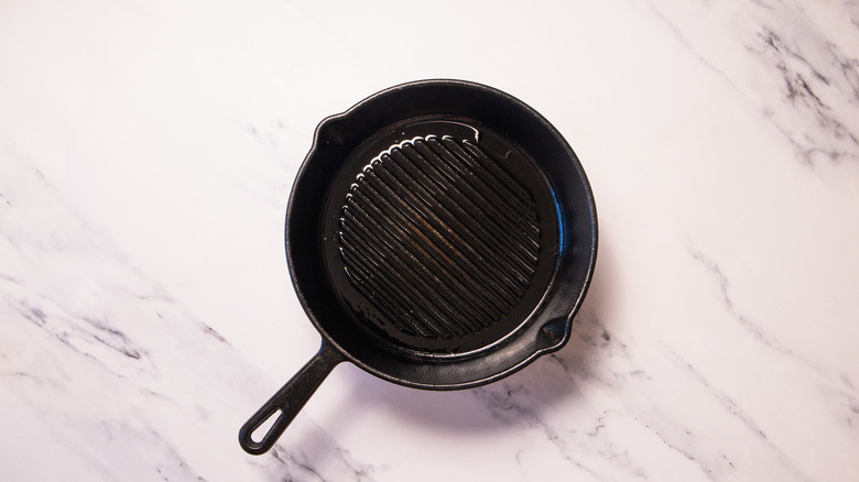 Preheat cast iron grill pan