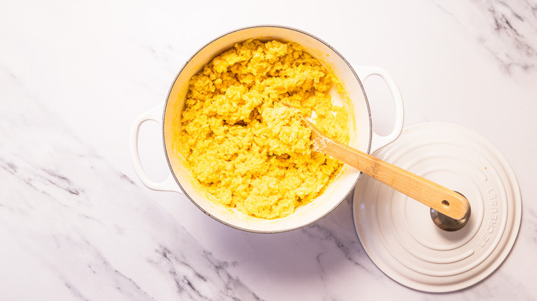 Cooked saffron risotto in pot