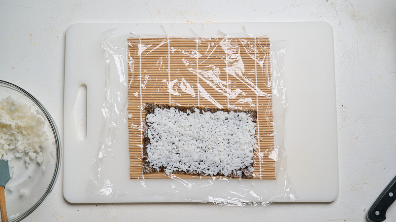 rice spread on top of nori sheet