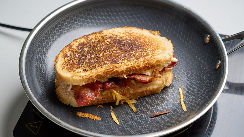 grilled cheese sandwich cooking on a skillet